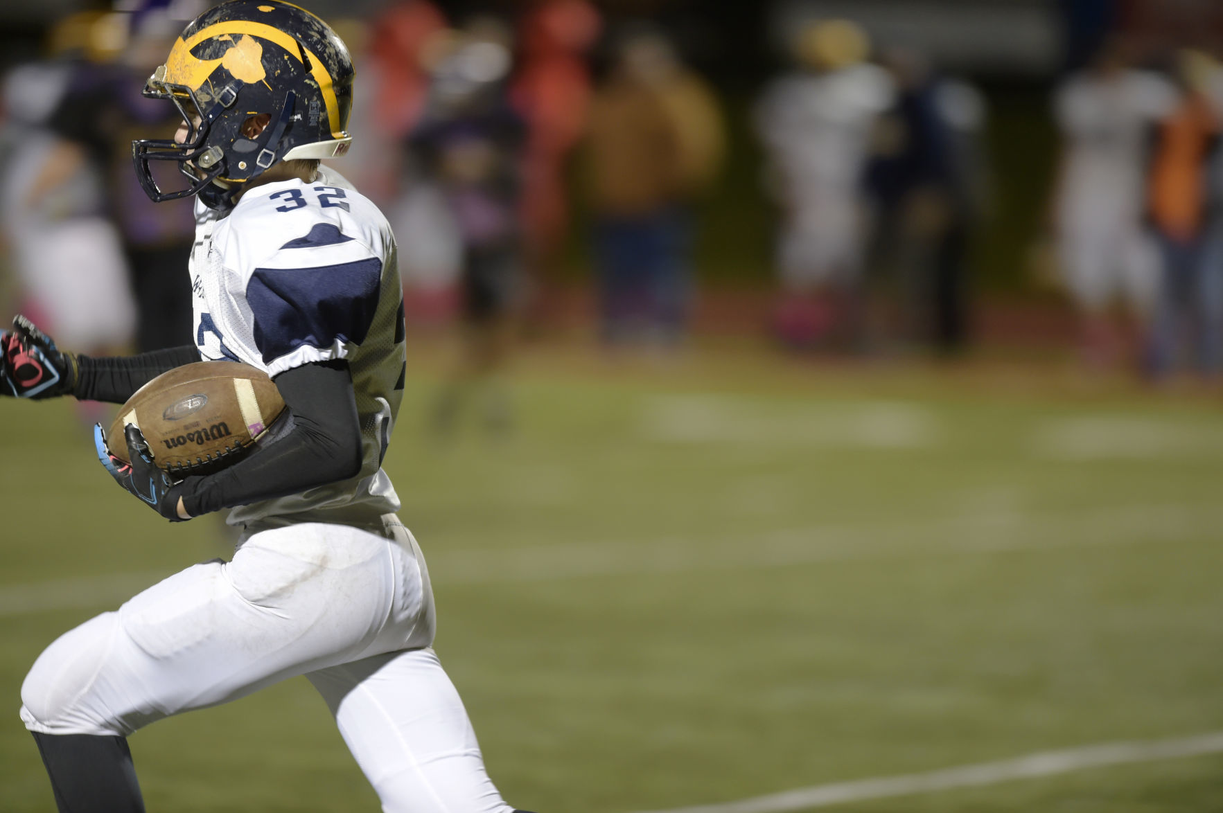 Ozaukee High School's returner sprints upfield